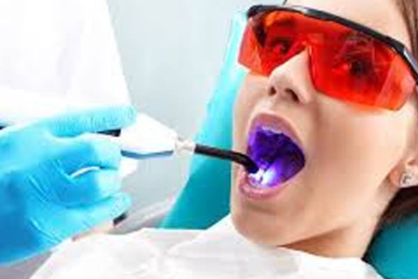 https://thedentists.in.net/wp-content/uploads/2024/12/Laser-dental-treatment.jpg